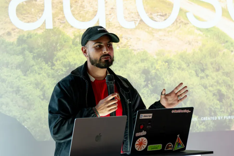 Furquan speaking on stage